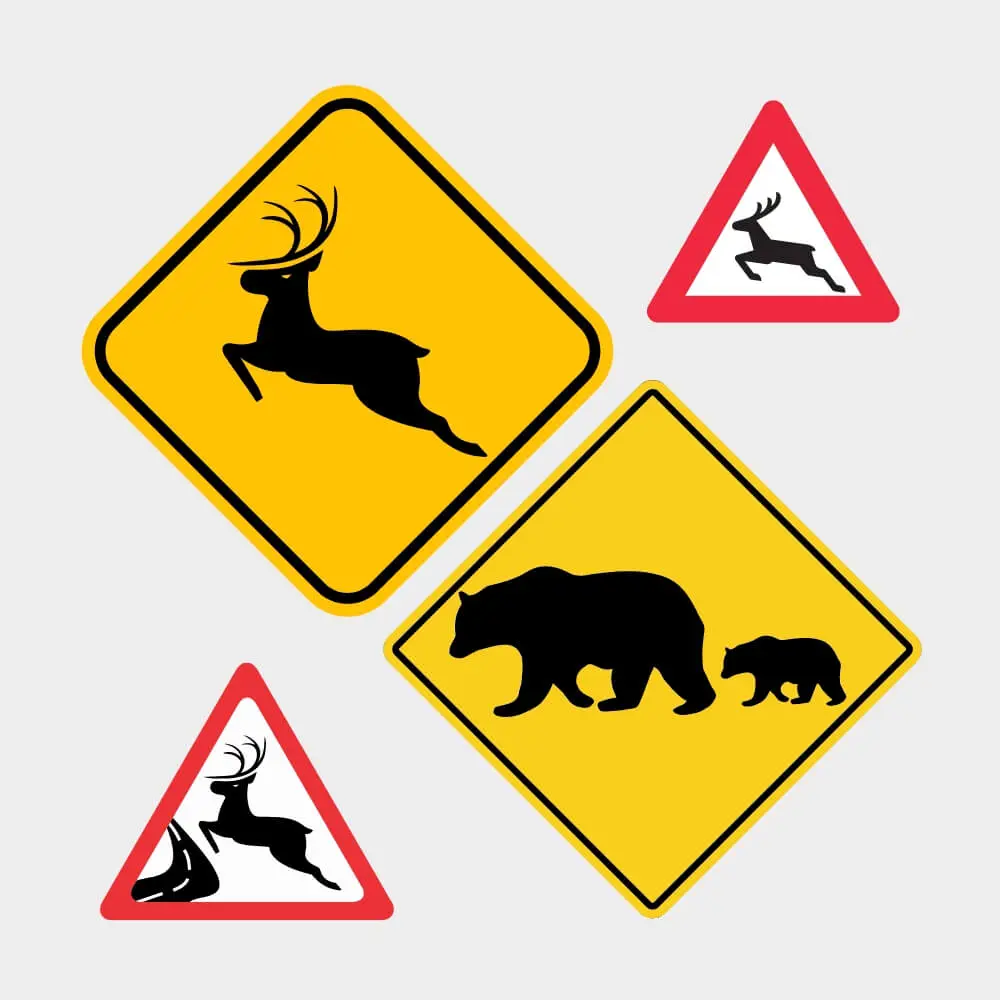 Traffic sign - Wild animal crossing road symbol in red triangle